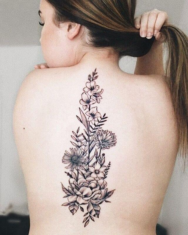 Giant spine tattoo floral Idea
